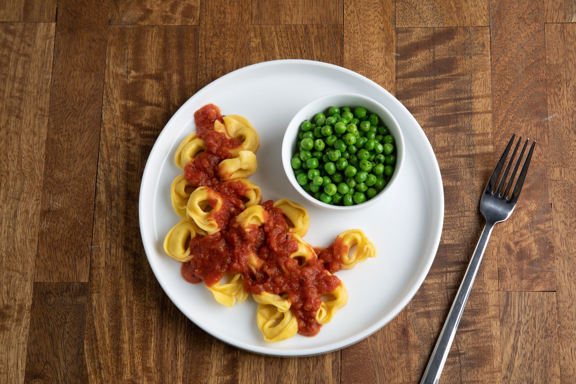 Cheese Tortellini, Marinara Sauce, Seasoned Peas